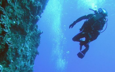 Saipan diving: unique underwater architecture, rich marine flora, reefs and grottos, remains of military machinery of World War II bloody battles